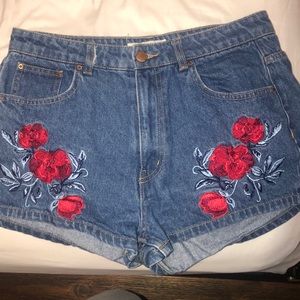 Size 12 jean shorts , rose decal (H&M)